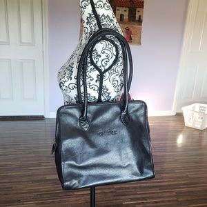 Vegan leather tote. Imported.